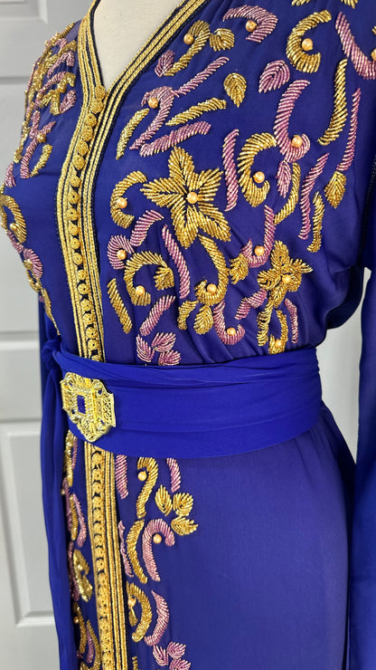 Royal blue Moroccan Kaftan made from premium crepe silk with gold and lilac embroidery, matching belt with tassels – one size fits all, available at Tendances An-Nisa Montréal and Shopanisa.ca