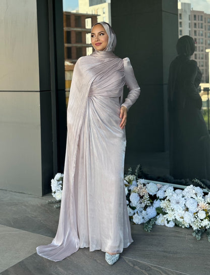 Graceful modest evening dress featuring diagonal pleats, floor-length flow, and a matching hijab — ideal for engagement or reception events