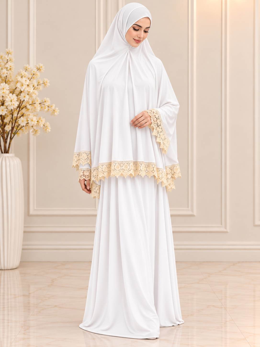 Elegant white 2-piece Islamic prayer set featuring a flowing khimar, matching full-length skirt, and delicate cream floral lace trim, modeled by a Muslim woman.